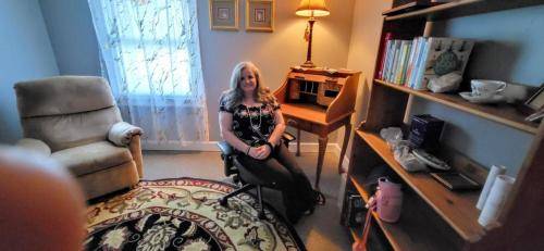 Elizabeth in the Hypnotherapy office